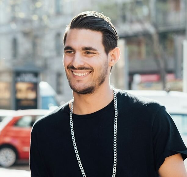 Young handsome italian boy walking in the city